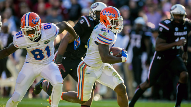 Nov 14, 2015; Columbia, SC, USA; Florida Gators running back Kelvin Taylor (21) rushes for a 53 yard gain against the South Carolina Gamecocks in the second half at Williams-Brice Stadium. Mandatory Credit: Jeff Blake-USA TODAY Sports