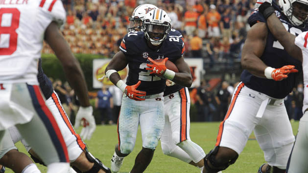 Oct 7, 2017; Auburn, AL, USA; Auburn Tigers running back Kerryon Johnson (21) runs against the Ole Miss Rebels during the third quarter at Jordan-Hare Stadium. Photo Credit: John Reed-USA TODAY Sports