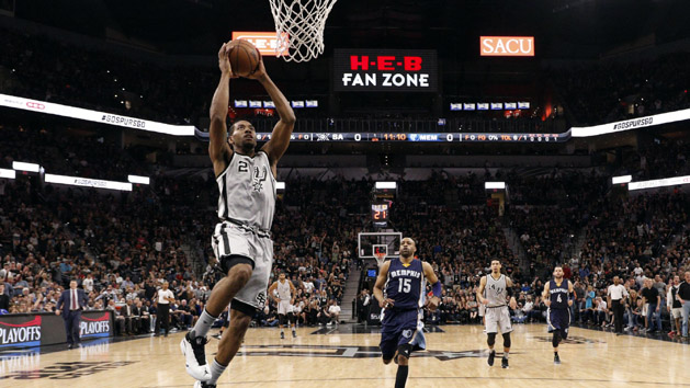 Apr 17, 2016; San Antonio, TX, USA; San Antonio Spurs small forward Kawhi Leonard (2) dunks the ball against the Memphis Grizzlies during the first half in game one of the first round of the NBA Playoffs at AT&T Center. Photo Credit: Soobum Im-USA TODAY Sports