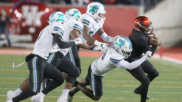 Nov 15, 2018; Houston, TX, USA; Houston Cougars quarterback D'Eriq King (4) is tackled by Tulane Green Wave linebacker Marvin Moody (28) in the second quarter at TDECU Stadium. Photo Credit: Thomas B. Shea-USA TODAY Sports