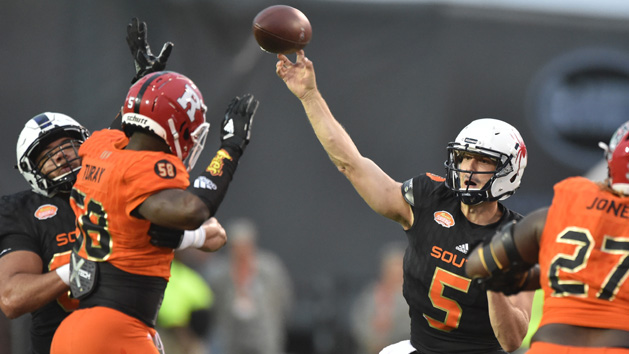 Jan 27, 2018; Mobile, AL, USA; South squad quarterback Kyle Lauletta of Richmond (5) throws a pass as North squad outside linebacker Kemoko Turay of Rutgers (58) rushes during the second half of the 2018 Senior Bowl at Ladd-Peebles Stadium. Photo Credit: Glenn Andrews-USA TODAY Sports