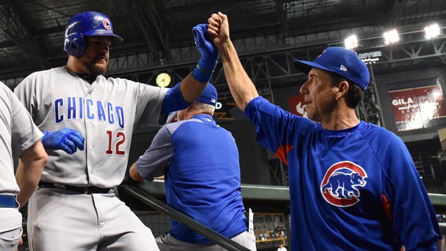 Aug 11, 2017; Phoenix, AZ, USA; Chicago Cubs outfielder Kyle Schwarber (12) is congratulated by catching coach Mike Borzello (58) after hitting a solo home run in the sixth inning against the Arizona Diamondbacks at Chase Field. Photo Credit: Jennifer Stewart-USA TODAY Sports
