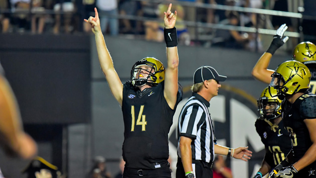 Sep 16, 2017; Nashville, TN, USA; Vanderbilt Commodores quarterback Kyle Shurmur (14) reacts after scoring the winning touchdown against the Kansas State Wildcats during the second half at Vanderbilt Stadium. Photo Credit: Jim Brown-USA TODAY Sports