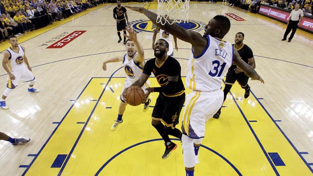 Jun 13, 2016; Oakland, CA, USA; Cleveland Cavaliers guard Kyrie Irving (2) shoots the ball against Golden State Warriors center Festus Ezeli (31) in game five of the NBA Finals at Oracle Arena. Photo Credit: Marcio Jose Sanchez-Pool Photo via USA TODAY Sports