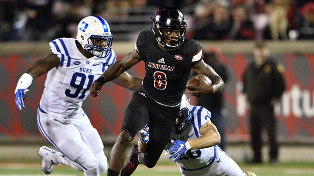 Sep 17, 2016; Louisville, KY, USA; Louisville Cardinals quarterback Lamar Jackson (8) avoids the tackle of Florida State Seminoles linebacker Dontavious Jackson (5) during the second quarter at Papa John's Cardinal Stadium. Photo Credit: Jamie Rhodes-USA TODAY Sports