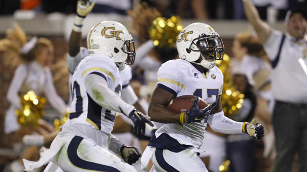 Oct 24, 2015; Atlanta, GA, USA; Georgia Tech Yellow Jackets defensive back Lance Austin (17) returns a blocked kick for a game winning touchdown against the Florida State Seminoles in the fourth quarter at Bobby Dodd Stadium. Georgia Tech defeated Florida State 22-16. Mandatory Credit: Brett Davis-USA TODAY Sports