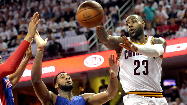 Apr 17, 2016; Cleveland, OH, USA; Cleveland Cavaliers forward LeBron James (23) passes the ball as Detroit Pistons center Andre Drummond (0) defends during the second half in game one of the first round of the NBA Playoffs at Quicken Loans Arena. The Cavs beat the Pistons 106-101. Mandatory Credit: Ken Blaze-USA TODAY Sports