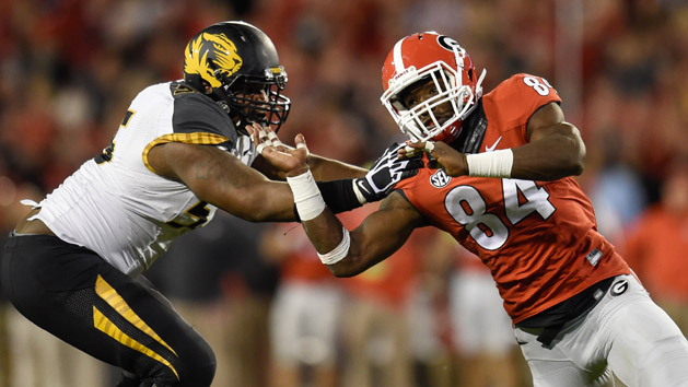 Oct 17, 2015; Athens, GA, USA; Georgia Bulldogs linebacker Leonard Floyd (84) and Missouri Tigers offensive lineman Nate Crawford (55) battle during the second half at Sanford Stadium. Georgia defeated Missouri 9-6. Mandatory Credit: Dale Zanine-USA TODAY Sports
