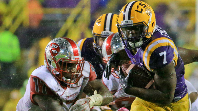 Oct 24, 2015; Baton Rouge, LA, USA; LSU Tigers running back Leonard Fournette (7) runs against the Western Kentucky Hilltoppers during the second quarter of a game at Tiger Stadium. Mandatory Credit: Derick E. Hingle-USA TODAY Sports
