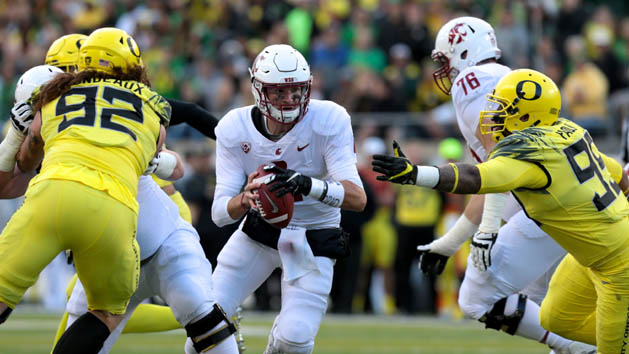 Oct 7, 2017; Eugene, OR, USA; Washington State Cougars quarterback Luke Falk (4) runs the ball in the first half as Oregon Ducks defensive lineman Henry Mondeaux (92) and Oregon Ducks defensive lineman Austin Faoliu (99) defend at Autzen Stadium. Photo Credit: Scott Olmos-USA TODAY Sports
