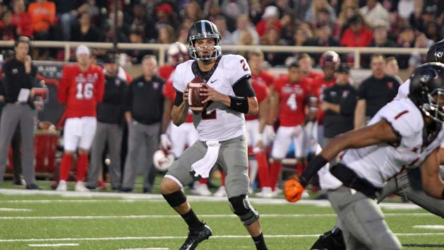 Sep 30, 2017; Lubbock, TX, USA; Oklahoma State Cowboys quarterback Mason Rudolph (2) drops back to pass against the Texas Tech Red Raiders in the first half at Jones AT&T Stadium. Photo Credit: Michael C. Johnson-USA TODAY Sports