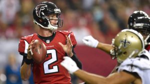 Falcons pick off Manning three times, edge Broncos