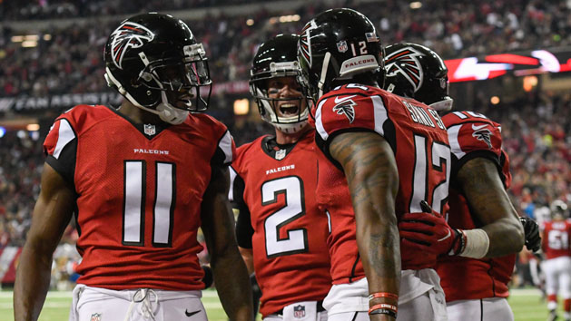Jan 1, 2017; Atlanta, GA, USA; Atlanta Falcons wide receiver Mohamed Sanu (12) reacts with wide receiver Julio Jones (11) and quarterback Matt Ryan (2) after catching a touchdown pass against the New Orleans Saints during the first half at the Georgia Dome. Photo Credit: Dale Zanine-USA TODAY Sports