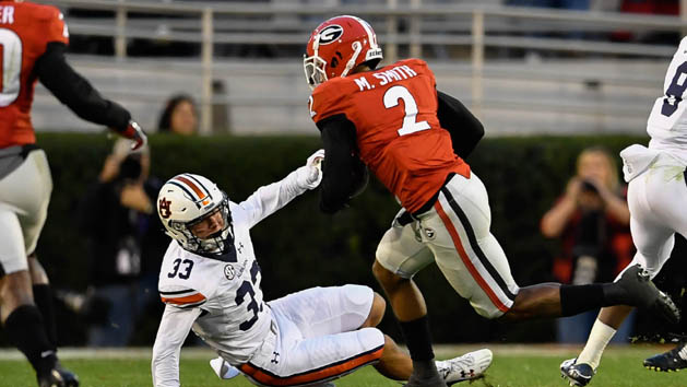 Nov 12, 2016; Athens, GA, USA; Georgia Bulldogs defensive back Maurice Smith (2) runs past Auburn Tigers receiver Will Hastings (33) after intercepting a pass and returning it for a touchdown during the second half at Sanford Stadium. Georgia defeated Auburn 13-7. Photo Credit: Dale Zanine-USA TODAY Sports