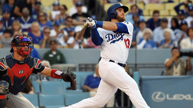 Jun 9, 2018; Los Angeles, CA, USA; Los Angeles Dodgers infielder Max Muncy (13) hits a solo home run against the Atlanta Braves in the first inning at Dodger Stadium. Photo Credit: Richard Mackson-USA TODAY Sports