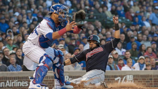 May 22, 2018; Chicago, IL, USA; Cleveland Indians right fielder Melky Cabrera (53) slides safely into home plate against Chicago Cubs catcher Willson Contreras (40) during the fourth inning at Wrigley Field. Photo Credit: Patrick Gorski-USA TODAY Sports
