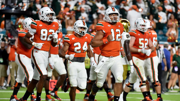 Nov 11, 2017; Miami Gardens, FL, USA; Miami Hurricanes quarterback Malik Rosier (12) runs in the end zone against Notre Dame Fighting Irish at Hard Rock Stadium. Photo Credit: Steve Mitchell-USA TODAY Sports