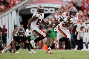 Brady, Edwards Drive Bucs Past Stubborn Falcons