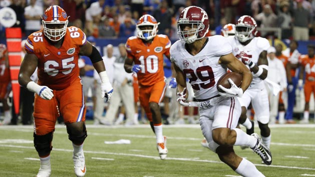 Dec 3, 2016; Atlanta, GA, USA; Alabama Crimson Tide defensive back Minkah Fitzpatrick (29) runs the ball for a touchdown during the first quarter of the SEC Championship college football game against the Florida Gators at Georgia Dome. Photo Credit: Jason Getz-USA TODAY Sports