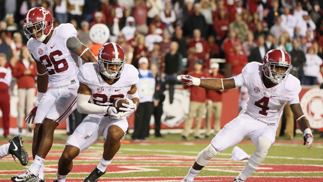 Oct 8, 2016; Fayetteville, AR, USA; Alabama Crimson Tide defensive back Minkah Fitzpatrick (29) intercepts a pass against the Arkansas Razorbacks and returns it for a touchdown during the fourth quarter at Donald W. Reynolds Razorback Stadium. Alabama defeated Arkansas 49-30. Photo Credit: Nelson Chenault-USA TODAY Sports