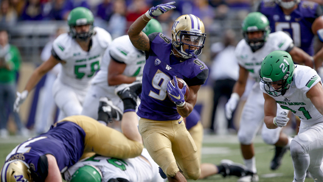 Sep 8, 2018; Seattle, WA, USA; Washington Huskies running back Myles Gaskin (9) dances around North Dakota Fighting Hawks defenders during the third quarter at Husky Stadium. Photo Credit: Jennifer Buchanan-USA TODAY Sports