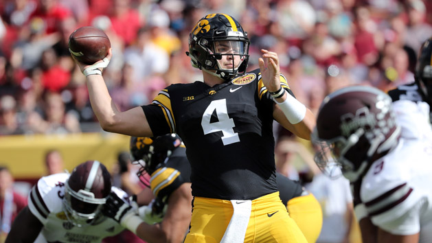 Jan 1, 2019; Tampa, FL, USA; Iowa Hawkeyes quarterback Nate Stanley (4) throws the ball against the Mississippi State Bulldogs during the second quarter in the 2019 Outback Bowl at Raymond James Stadium. Photo Credit: Kim Klement-USA TODAY Sports
