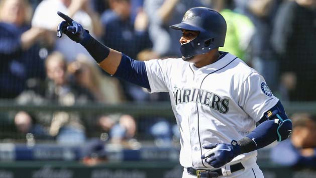 Mar 31, 2018; Seattle, WA, USA; Seattle Mariners designated hitter Nelson Cruz (23) points to the stands after hitting a two-run homer against the Cleveland Indians during the sixth inning at Safeco Field. Photo Credit: Joe Nicholson-USA TODAY Sports