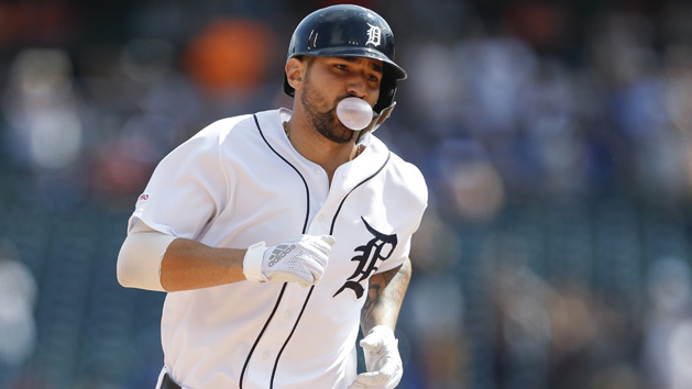 Jul 21, 2019; Detroit, MI, USA; Detroit Tigers designated hitter Nicholas Castellanos (9) blows a bubble as he rounds the bases after hitting a solo walk off home run during the tenth inning against the Toronto Blue Jays at Comerica Park. Photo Credit: Raj Mehta-USA TODAY Sports