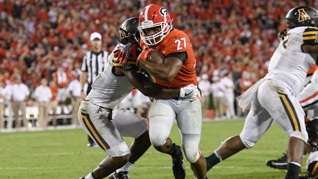 Sep 2, 2017; Athens, GA, USA; Georgia Bulldogs running back Nick Chubb (27) breaks a tackle by Appalachian State Mountaineers defensive back Josh Thomas (7) to score a touchdown during the second half at Sanford Stadium. Photo Credit: Dale Zanine-USA TODAY Sports