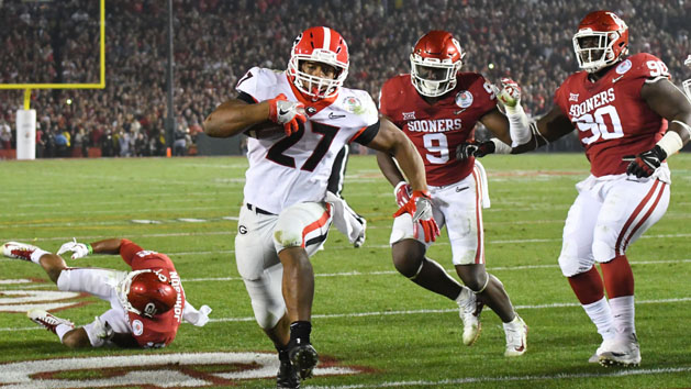Jan 1, 2018; Pasadena, CA, USA; Georgia Bulldogs running back Nick Chubb (27) runs in a touchdown against the Oklahoma Sooners in the fourth quarter in the 2018 Rose Bowl college football playoff semifinal game at Rose Bowl Stadium. Photo Credit: Jayne Kamin-Oncea-USA TODAY Sports