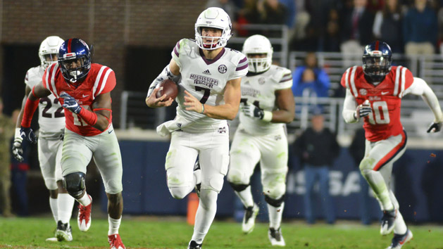 Nov 26, 2016; Oxford, MS, USA; Mississippi State Bulldogs quarterback Nick Fitzgerald (7) carries the ball during the second half of the game at Vaught-Hemingway Stadium. Mississippi State won 55-20 Photo Credit: Matt Bush-USA TODAY Sports