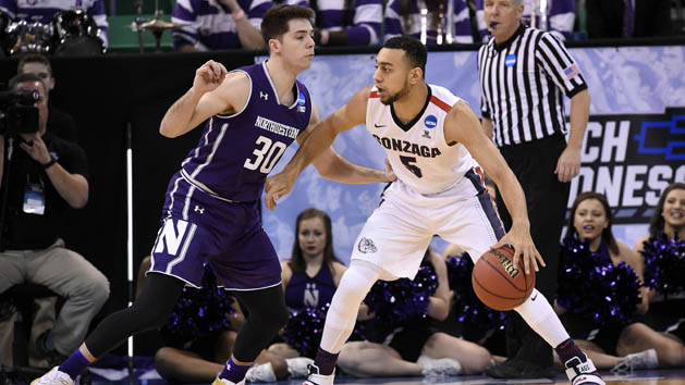 March 18, 2017; Salt Lake City, UT, USA; Gonzaga Bulldogs guard Nigel Williams-Goss (5) moves the ball against Northwestern Wildcats guard Bryant McIntosh (30) during the first half in the second round of the 2017 NCAA Tournament at Vivint Smart Home Arena. Mandatory Credit: Kelvin Kuo-USA TODAY Sports