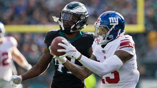 Nov 25, 2018; Philadelphia, PA, USA; New York Giants wide receiver Odell Beckham (13) makes a reception past Philadelphia Eagles cornerback DeVante Bausby (41) during the first quarter at Lincoln Financial Field. Photo Credit: Bill Streicher-USA TODAY Sports