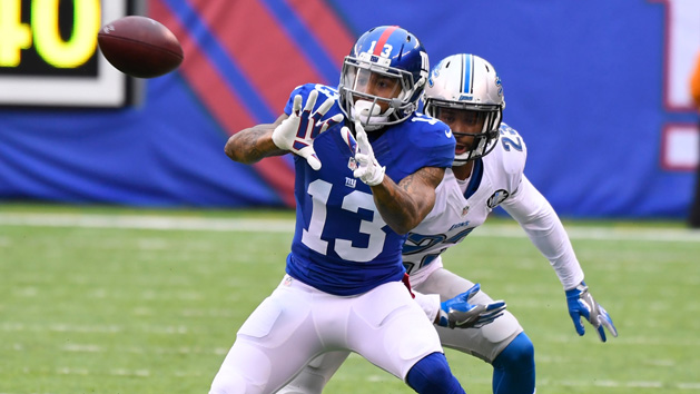 Dec 11, 2016; East Rutherford, NJ, USA; New York Giants wide receiver Odell Beckham (13) scores the game winning TD in the second half against the Dallas Cowboys at MetLife Stadium. Photo Credit: Robert Deutsch-USA TODAY Sports