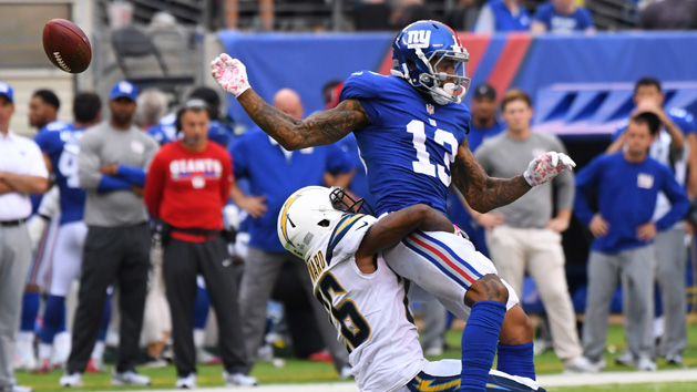 Oct 8, 2017; East Rutherford, NJ, USA; New York Giants wide receiver Odell Beckham Jr. (13) can't hang onto a 4th quarter pass and injured himself on the play. He left the game on a cart at MetLife Stadium. Photo Credit: Robert Deutsch-USA TODAY Sports