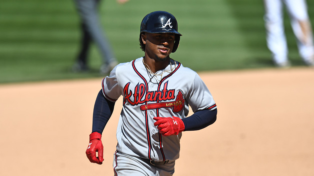 Apr 8, 2018; Denver, CO, USA; Atlanta Braves second baseman Ozzie Albies (1) rounds the bases after his solo home run in the seventh inning against the Colorado Rockies at Coors Field. Photo Credit: Ron Chenoy-USA TODAY Sports