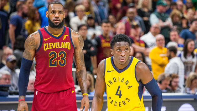 Apr 22, 2018; Indianapolis, IN, USA; Cleveland Cavaliers forward LeBron James (23) and Indiana Pacers guard Victor Oladipo (4) waiting for a free throw attempt in the second half of game four in the first round of the 2018 NBA Playoffs at Bankers Life Fieldhouse. Photo Credit: Trevor Ruszkowski-USA TODAY Sports
