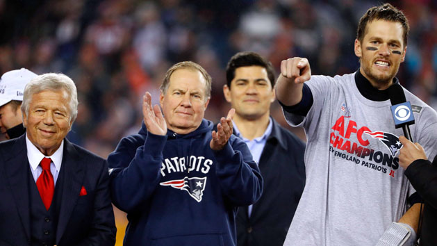 Jan 22, 2017; Foxborough, MA, USA; New England Patriots quarterback Tom Brady (12) points to teammates as head coach Bill Belichick and owner Robert Kraft look on after the 2017 AFC Championship Game against the Pittsburgh Steelers at Gillette Stadium. Photo Credit: Winslow Townson-USA TODAY Sports
