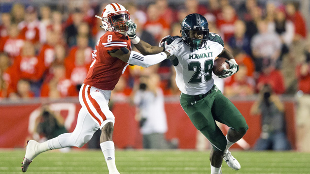 Paul Harris (29) rushes with the football as Wisconsin Badgers cornerback Sojourn Shelton (8) defends during the second quarter at Camp Randall Stadium last year. Photo Credit: Jeff Hanisch-USA TODAY Sports