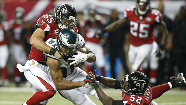 Sep 14, 2015; Atlanta, GA, USA; Atlanta Falcons inside linebacker Paul Worrilow (55) and Justin Durant (52) combine to tackle Philadelphia Eagles wide receiver Jordan Matthews (81) in the fourth quarter at the Georgia Dome. Mandatory Credit: Brett Davis-USA TODAY Sports