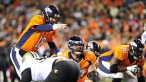On cue! Broncos whip Saints behind Manning