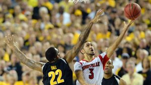 Louisville to edge Michigan in NCAA Tourney finale
