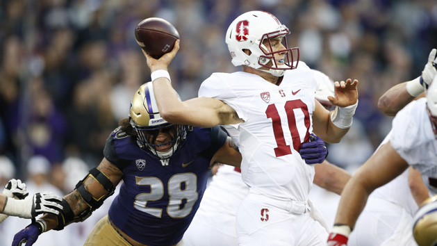 Sep 30, 2016; Seattle, WA, USA; Washington Huskies linebacker Psalm Wooching (28) gets a hand on Stanford Cardinal quarterback Keller Chryst (10) during the first quarter at Husky Stadium. Photo Credit: Jennifer Buchanan-USA TODAY Sports