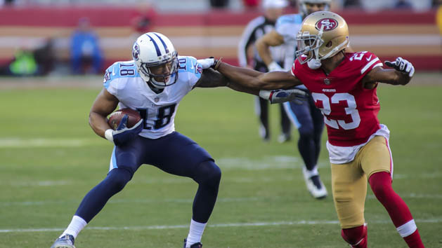 Dec 17, 2017; Santa Clara, CA, USA; Tennessee Titans wide receiver Rishard Matthews (18) runs with the ball against San Francisco 49ers cornerback Ahkello Witherspoon (23) during the third quarter at Levi's Stadium. Photo Credit: Sergio Estrada-USA TODAY Sports