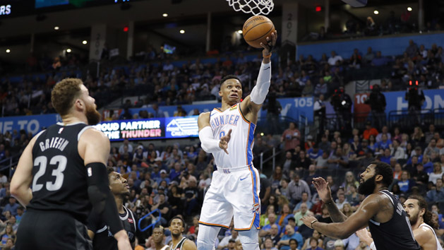 Apr 5, 2019; Oklahoma City, OK, USA; Oklahoma City Thunder guard Russell Westbrook (0) goes to the basket between Detroit Pistons forward Blake Griffin (23) and center Andre Drummond (0) during the second half at Chesapeake Energy Arena. Oklahoma City won 123-110. Photo Credit: Alonzo Adams-USA TODAY Sports