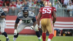 Broncos sign OT Okung to five-year deal