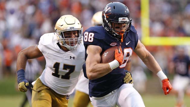 Sep 12, 2015; Charlottesville, VA, USA; Virginia Cavaliers wide receiver Ryan Santoro (88) runs with the ball as Notre Dame Fighting Irish linebacker James Onwualu (17) chases in the fourth quarter at Scott Stadium. The Fighting Irish won 34-27. Mandatory Credit: Geoff Burke-USA TODAY Sports