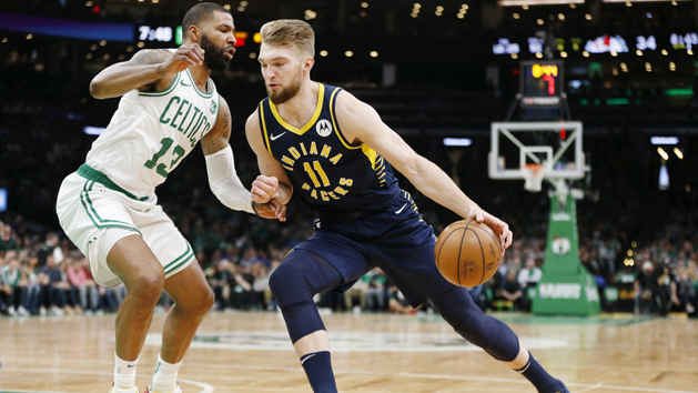 Apr 17, 2019; Boston, MA, USA; Indiana Pacers center Domantas Sabonis (11) drives against Boston Celtics forward Marcus Morris (13) during the first half in game two of the first round of the 2019 NBA Playoffs at TD Garden. Photo Credit: Greg M. Cooper-USA TODAY Sports
