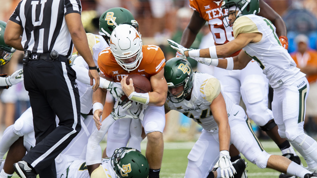 Oct 13, 2018; Austin, TX, USA; Texas Longhorns quarterback Sam Ehlinger (11) runs the ball against the Baylor Bears during the first quarter at Darrell K Royal-Texas Memorial Stadium. Photo Credit: John Gutierrez-USA TODAY Sports