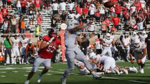 Moore’s Third Scoring Catch Saves ‘Horns in Overtime